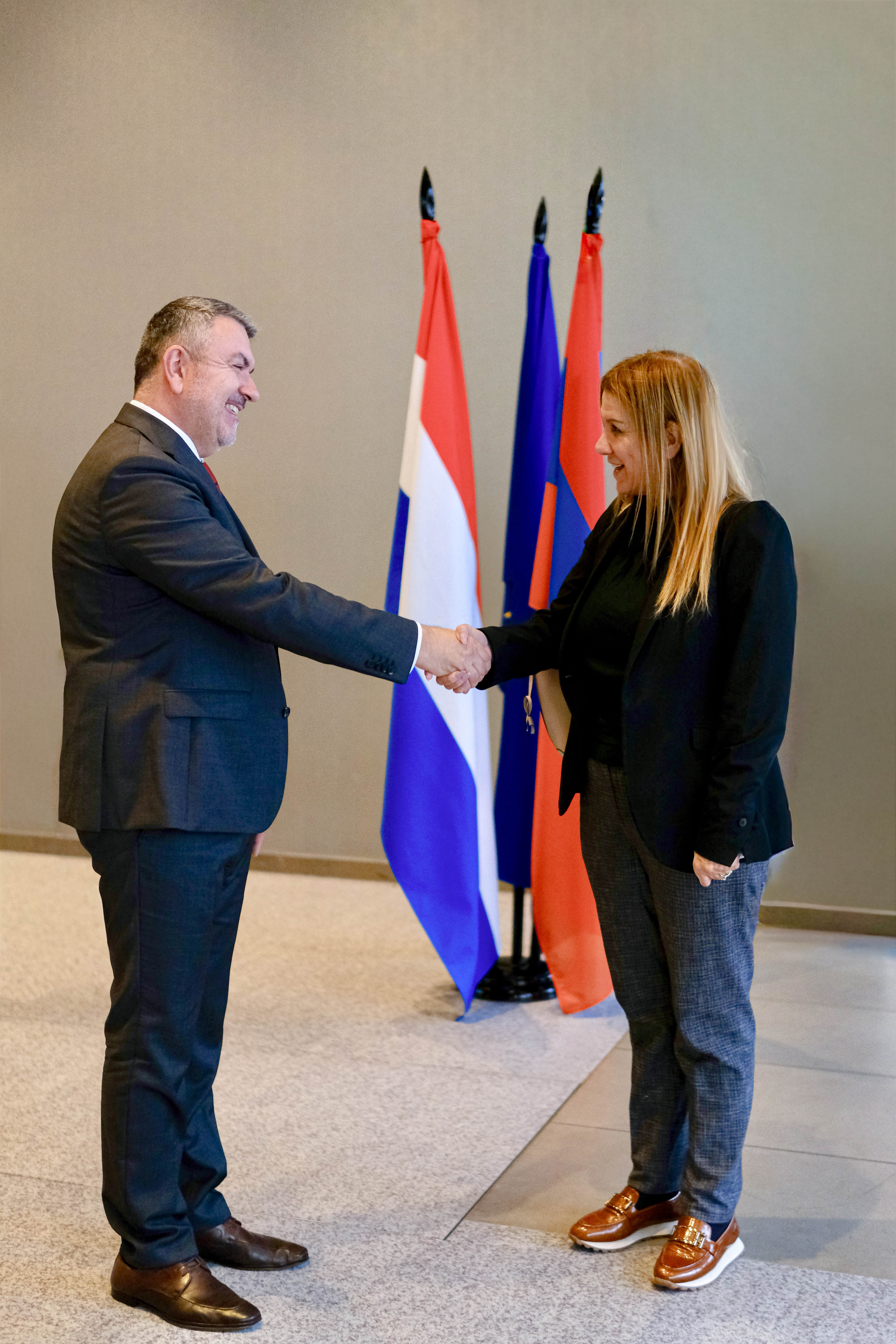 Armenian Embassy reception – greeting between guests, The Hague