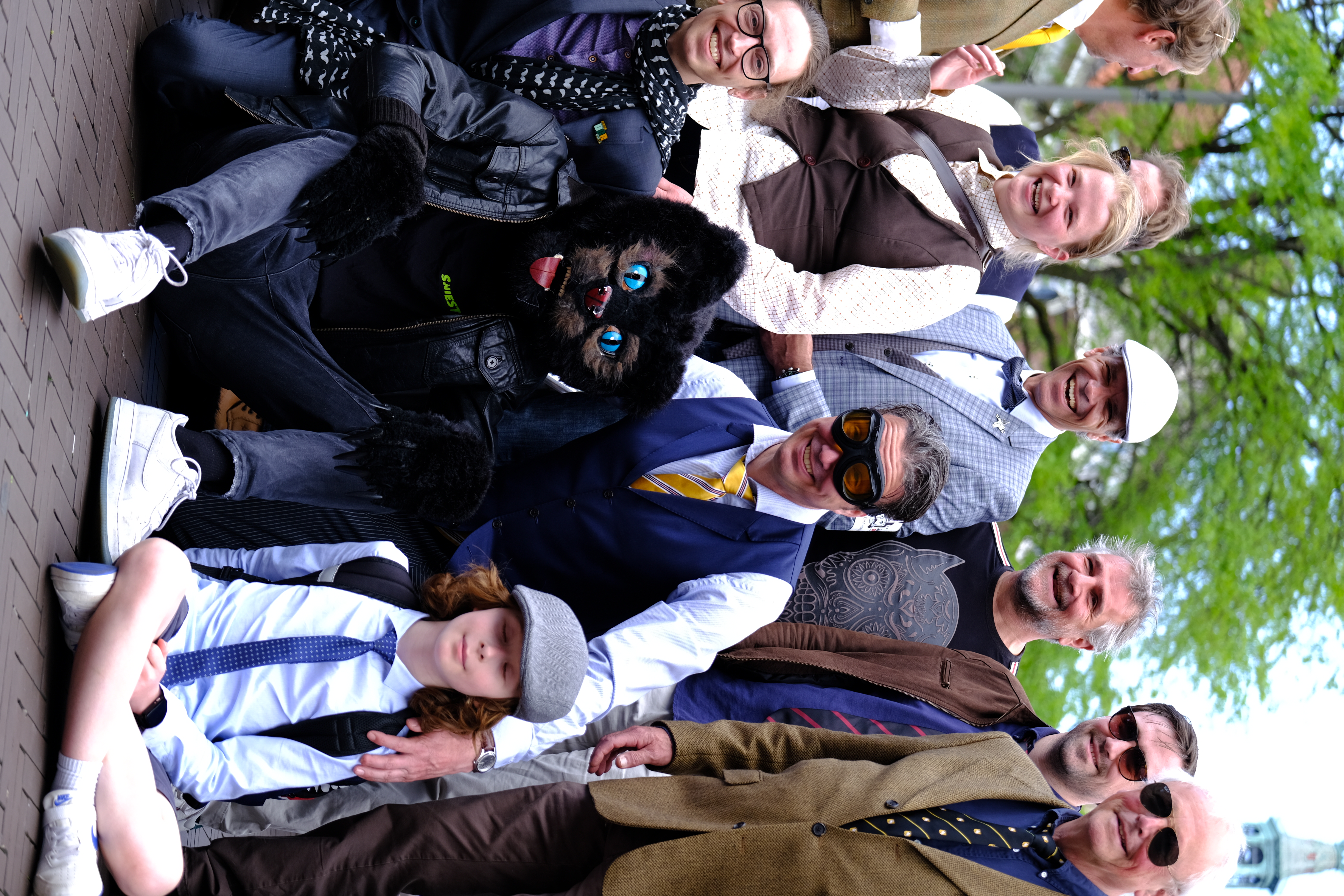 Gentleman’s Ride group of smiling riders in classic attire, The Hague